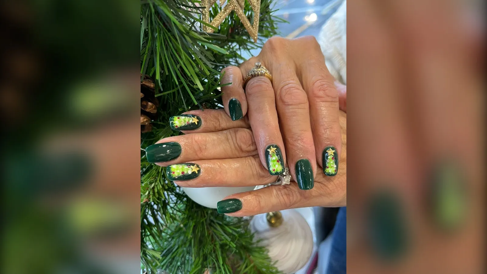 Dark evergreen Christmas nails with glitter Christmas tree accent nails