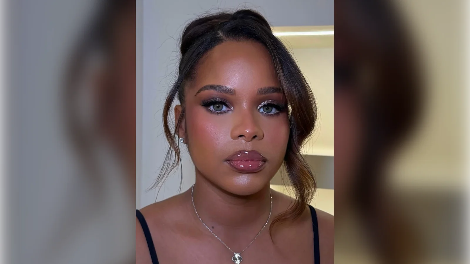 Smoky eye New Years Eve makeup with a glossy mauve lip